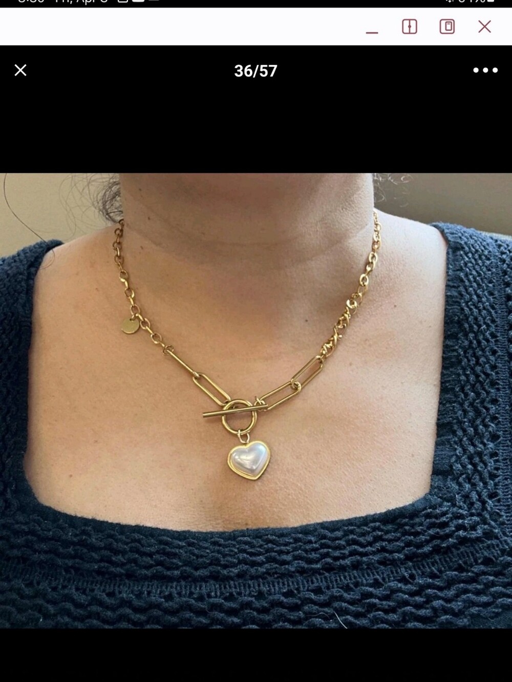 Necklace with a heart shaped pearl